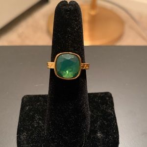 Vibrant gold and green Coach ring